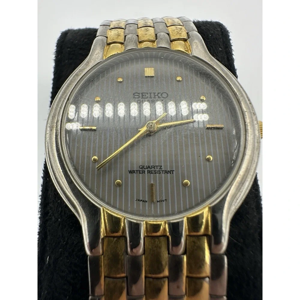 Vintage Seiko Quartz Two Tone Gray Striped Dial Dress Watch 7.5